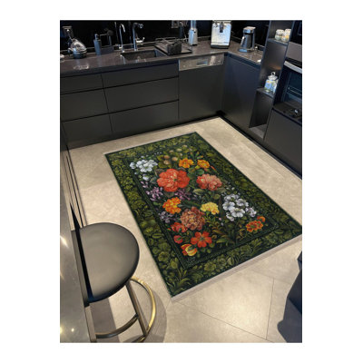 Tapis décoratif vert à motif floral multicolore