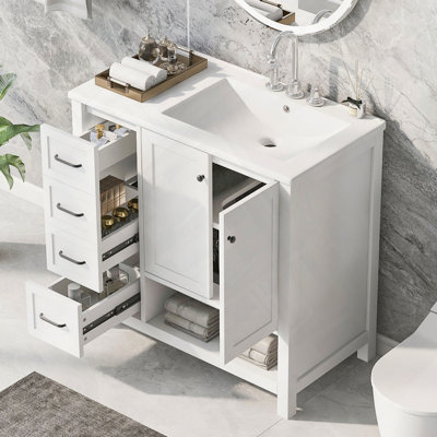 Meuble-lavabo de salle de bain avec meuble-lavabo, deux portes, deux tiroirs et une tablette ouverte