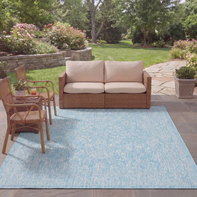Tapis d'intérieur / extérieur de couleur unie Amedee Performance