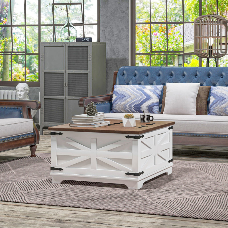 Table basse blanche avec dessus rabattable et grand compartiment de rangement dissimulé