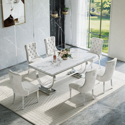 Ensemble de salle à manger moderne - table de 70 po avec base en acier inoxydable et chaises en velours