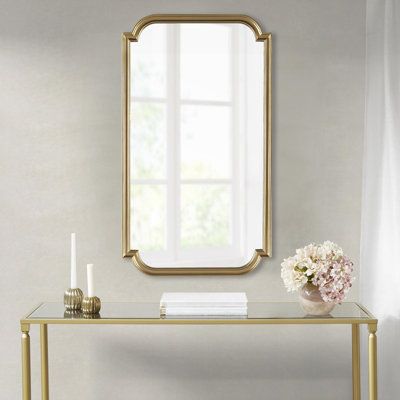 Miroir mural doré