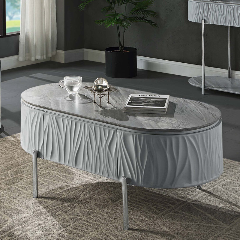 Table basse grise ultrabrillante et chrome