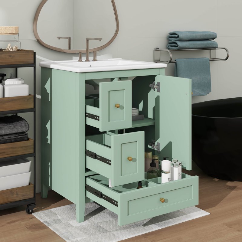Meuble-lavabo 24 po avec lavabo encastré en céramique, armoire de rangement polyvalente avec trois tiroirs et séparateurs amovibles, plus porte à fermeture en douceur