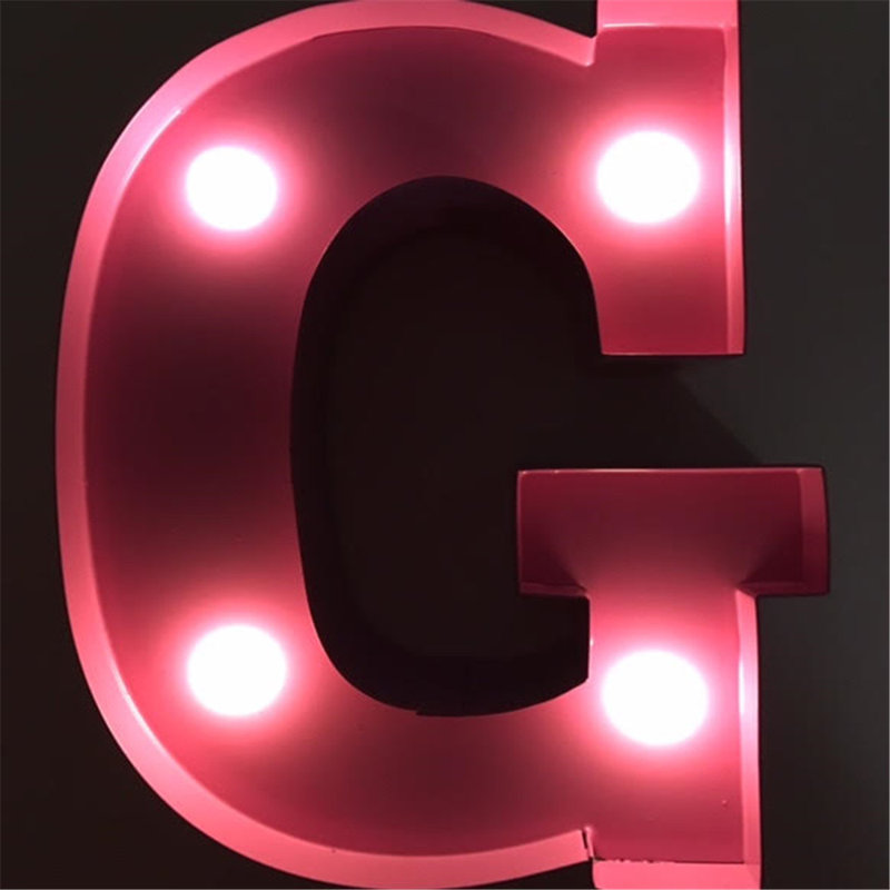 Enseigne lumineuse del lettre g, Rose