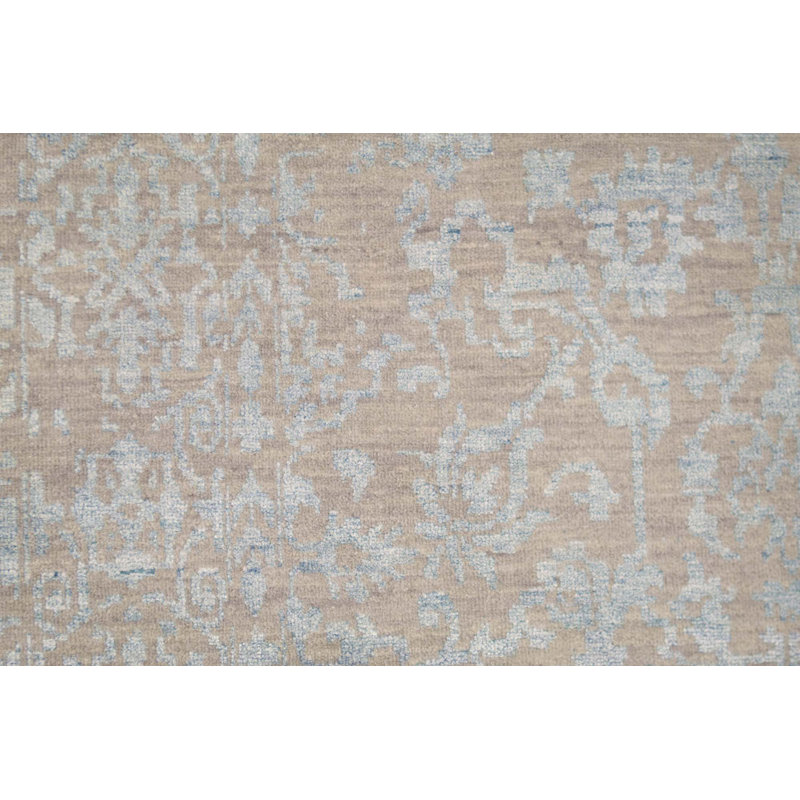 Tapis beige / ivoire de haute qualité noué à la main