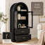 Meuble de rangement moderne noir à dessus arqué avec portes vitrées, étagères et tiroirs