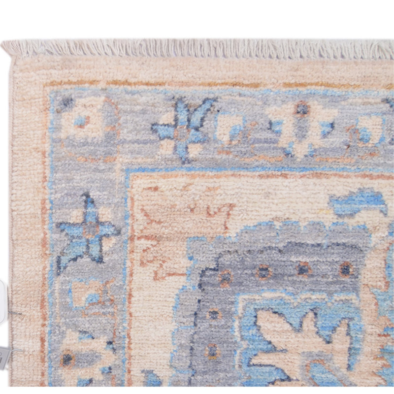 Tapis beige et ivoire noué à la main de haute qualité