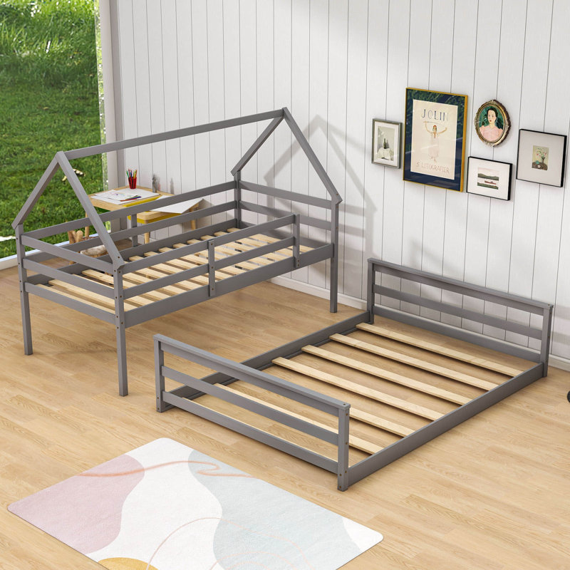 Lit superposé simple au-dessus d'un lit double en bois, gris