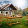 Celise Extendable Rectangular Teak Outdoor Dining Table