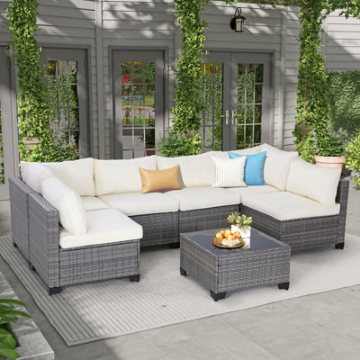 7-Piece Rattan Outdoor Sectional Seating Group with Cushions