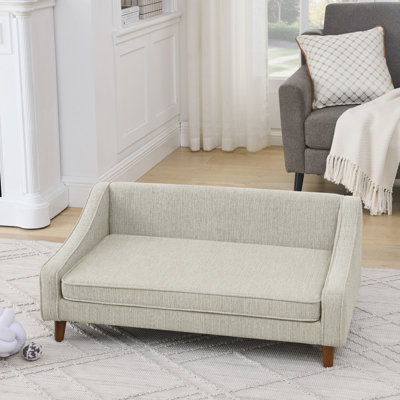 Canapé-lit surélevé durable et confortable avec accoudoirs irréguliers de conception moderne, idéal pour les chiens de taille moyenne et grande