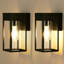 Lanterne murale d'extérieur matte noire moderne en métal imperméable avec abat-jour en verre pour porche, entrée et garage-801218633-801218628