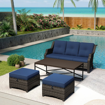 Ensemble de patio extérieur en osier pour 3 personnes avec canapé 3 places, repose-pieds, table basse et coussin bleu