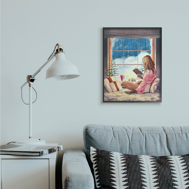Fille lisant par une fenêtre d'hiver enneigée, Giclée encadrée noir minuit, H 30 po x l 24 po