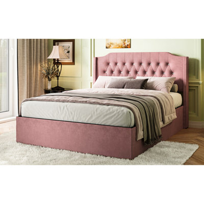 Structure de lit grand de luxe avec revêtement, boutons en cristal, tête de lit à oreilles et rangement sous le lit, somptueux espace de rangement rose