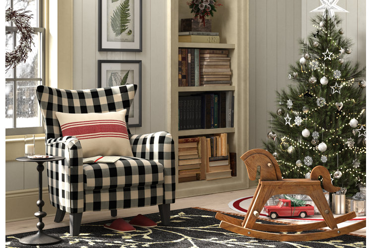 cozy farmhouse living room with a neutral silver-themed Christmas tree