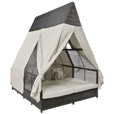 Luxurious Outdoor Daybed With Privacy Curtains And Multiple Pillows For Ultimate Comfort