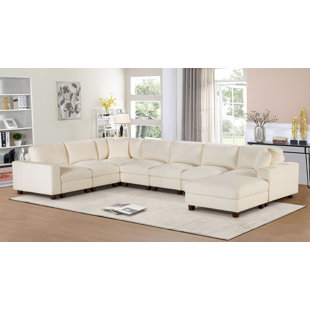 Canapé modulaire en chenille avec repose-pieds Elara