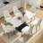 63"Modern Artificial Stone White Curved Black Metal Leg Dining Table -6 People-1898117532-1898117511-1890055335