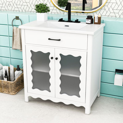 Meuble-lavabo élégant avec lavabo en céramique, tablette réglable, portes à fermeture en douceur et décorations en verre trempé
