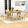 Ensemble de salle à manger avec table rectangulaire en bois et chaises rembourrées en lin