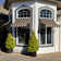 Awntech Charleston Acrylic Fabric Awning with Iron Scroll Arms