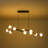 Dekisha 10-Light Glass Globe Branch Linear Chandelier