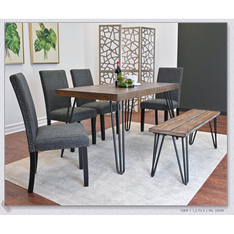 Ensemble de table de salle à manger 6 pièces avec chaises rembourrées confortables, idéal pour les espaces compacts et les intérieurs modernes.