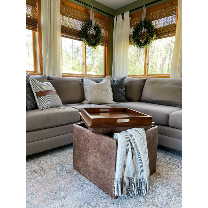 Saahith Faux Leather Ottoman