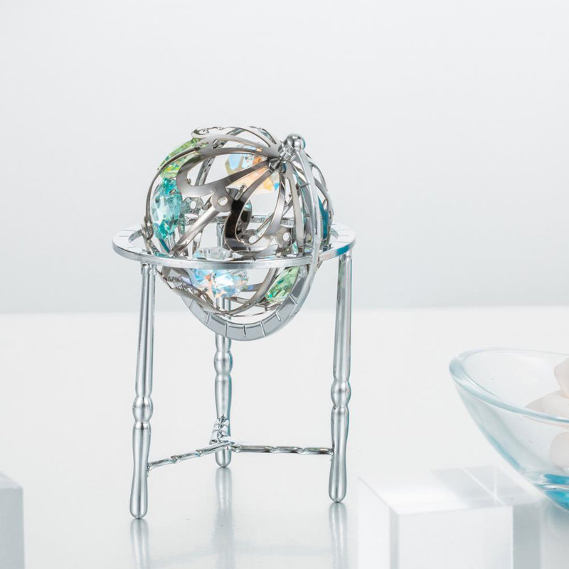 Sculpture de globe terrestre en cristal garniture cloutée, Argent