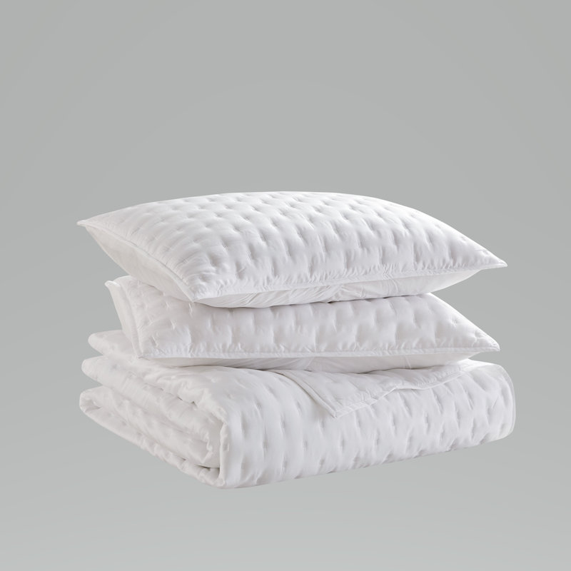 Lana Silky Tencel Quilt/Coverlet Set by Studio 16, Toronto. Crafted from 100% TENCEL, this set boasts an exceptionally soft hand feel, delivering a smooth, silky touch that elevates your sleep experience.