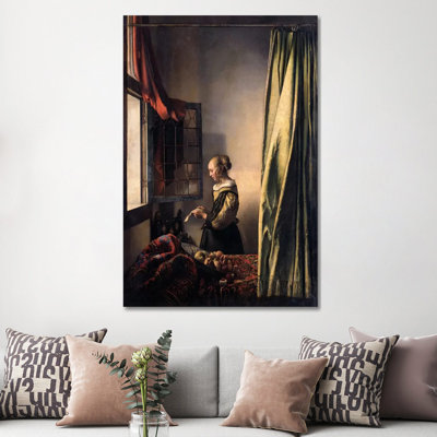 Girl Reading A Letter At An Open Window by Johannes Vermeer - Wrapped Canvas Painting
