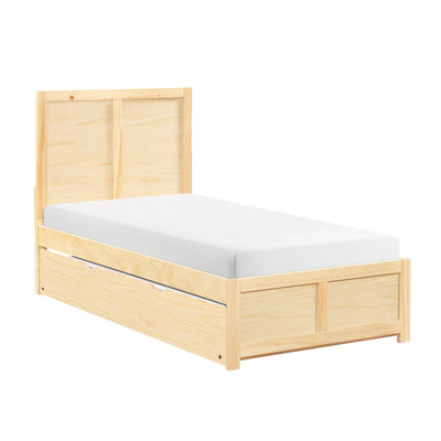 Lit simple avec lit gigogne escamotable, style contemporain, aspect pin naturel, convient au cadre de chambre à coucher de style bord de mer