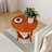 Contemporary Round Shelf End Table, Orange