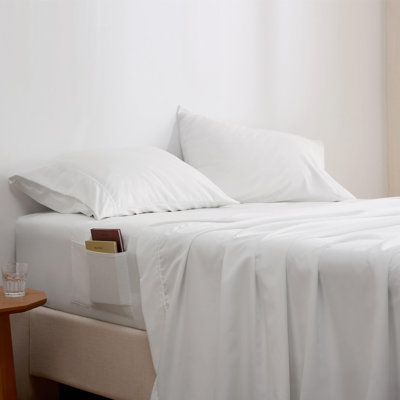 Ensemble de draps avec poche latérale