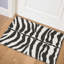 Tapis noir tissé à la machine Reme-783458935