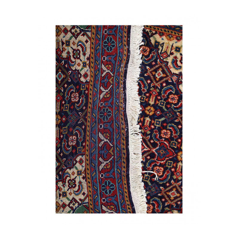 Chinika Hand Knotted Wool Area Rug in Beige