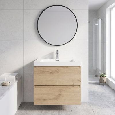 Meuble-lavabo mural de 61 cm (24 po) en bois naturel MFC avec dessus en résine blanche brute et carbonate de calcium, avec deux tiroirs coulissants en forme de U à fermeture douce, préassemblé.