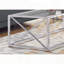 Table basse transparente en verre trempé avec base chromée en X