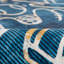 Tapis bleu tissé à la machine Sportsglyphs-124237660