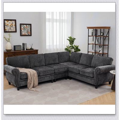 Luxurious Chenille Modular Sectional Sofa with Rolled Armrests and Rivets, Perfect for Comfortable and Stylish Gatherings.