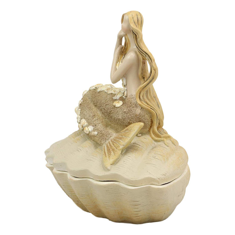 Sursirène abstrait brun sable sur le figurine de coquillage de mer géante