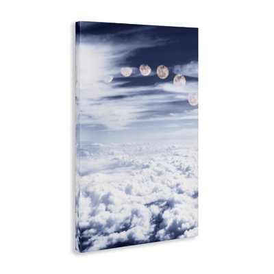 «Moon Phases Over Clouds» par Sundance Group