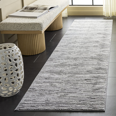 Tapis performance sans motif Lunara 302