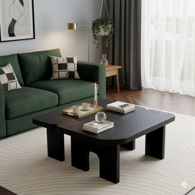 Un ensemble de tables gigognes modernes en bois noir qui peuvent être jointes pour former une table centrale extensible de 70,86 po pour les salons. Une pièce décorative peu encombrante avec une surface lisse.