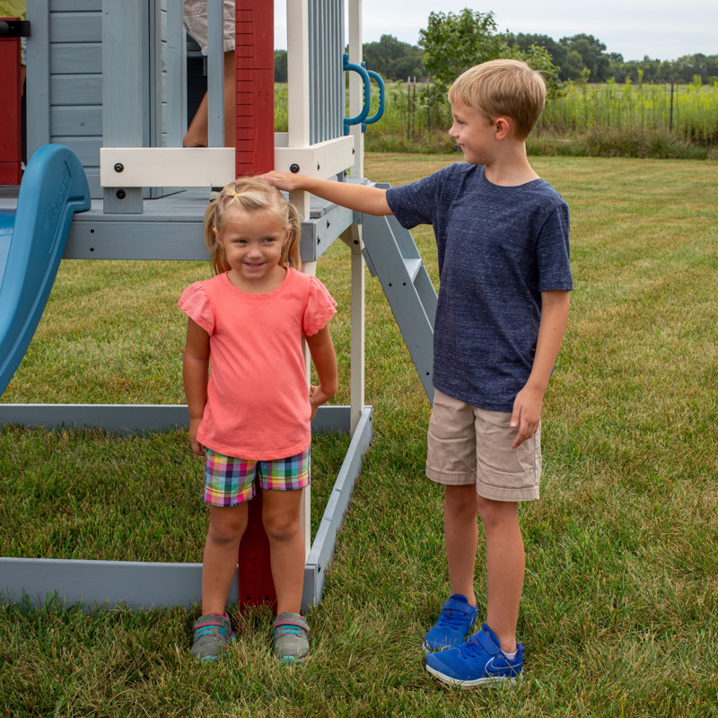 Beacon Heights Elevated Cedar Playhouse with Slide and Ladder
