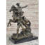 Statue de bronze d'un cowboy de l'Ouest
