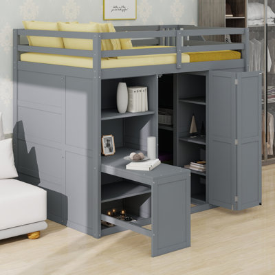 Lit mezzanine peu encombrant avec garde-robe, bureau et tablettes