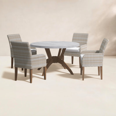 Akiva 52'' Round 4-Person Outdoor Dining Set with Sunbrella® Cushions
